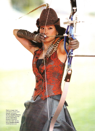 Illustration for article titled Lucy Liu Wins The Dumb Medal In Bazaar's Fashion Olympics